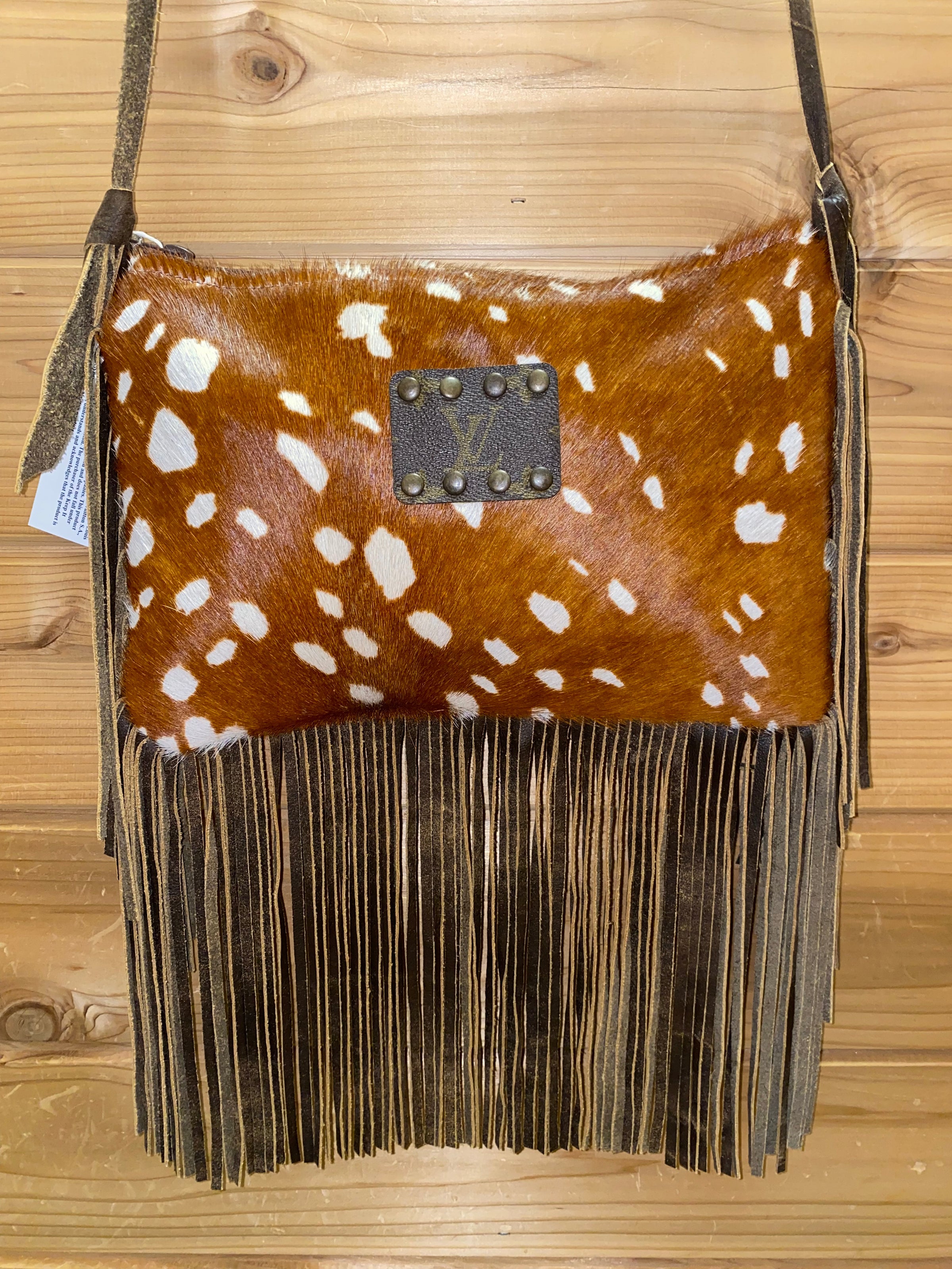 Love this Louis Vuitton && cowhide clutch with lots of handcut fringe!  #vjvdesigns